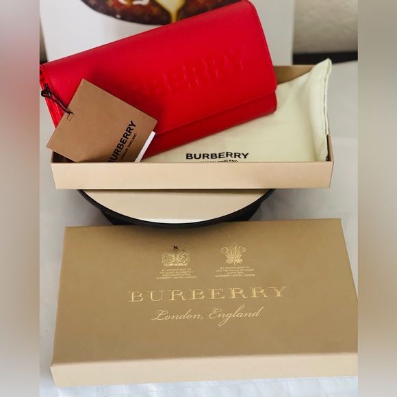 Burberry Handbags - BURBERRY NWT RED LEATHER WALLET SNAP CLOSURE. Approx. Measurement H 4”xW 8” 🔥❤️.